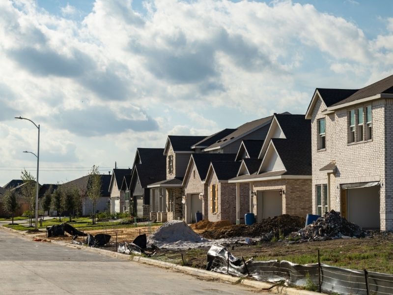 New residential subdivision with streets, homes, sidewalks, and utility infrastructure designed for long-term maintenance in Memphis, TN.